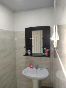 Ένα μπάνιο στο Casa acogedora en girardot