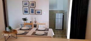 Kuchyň nebo kuchyňský kout v ubytování Apartment Mima with Sea View