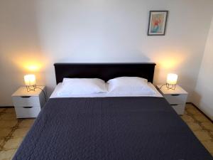 Postel nebo postele na pokoji v ubytování Apartment Mima with Sea View