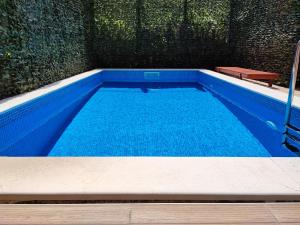 Der Swimmingpool an oder in der Nähe von Villa Vista Real