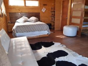 Voodi või voodid majutusasutuse Arce Marron toas
