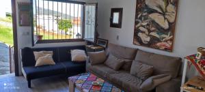 A seating area at Alquiler Casita en Facinas