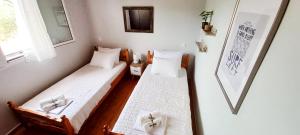 Кровать или кровати в номере Lily Home_Lefkada ~ Private Country house