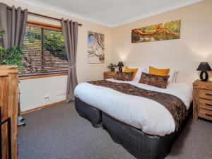 מיטה או מיטות בחדר ב-Mowamba D3