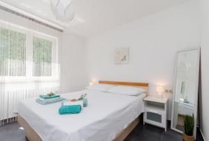 Posteľ alebo postele v izbe v ubytovaní Apartment Andrej