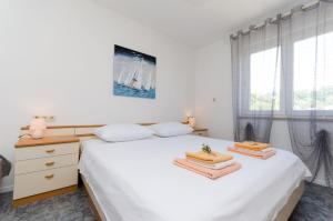 Posteľ alebo postele v izbe v ubytovaní Apartment Andrej