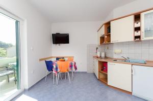 Kuchyňa alebo kuchynka v ubytovaní Apartments Ruzica M