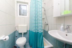 Kúpeľňa v ubytovaní Apartments Ruzica M + 26 fotografií