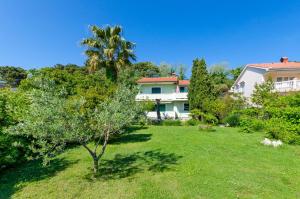 Vonkajšia záhrada v ubytovaní Apartments Ruzica M