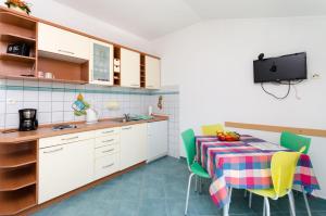 Kuchyňa alebo kuchynka v ubytovaní Apartments Ruzica M