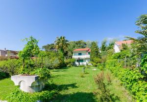 Vonkajšia záhrada v ubytovaní Apartments Ruzica M
