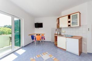 Kuchyňa alebo kuchynka v ubytovaní Apartments Ruzica M