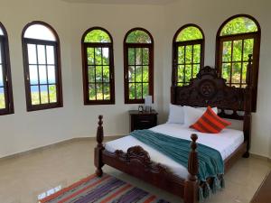 Postel nebo postele na pokoji v ubytování El Castillo Tropical + 37 fotografií