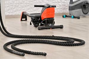 a reciprocatingsaw sitting on a tile floor with two hose at U Paesolu in Sainte-Lucie de Porto-Vecchio