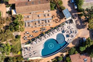 an overhead view of a building with a swimming pool at U Paesolu in Sainte-Lucie de Porto-Vecchio
