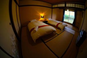 HA-MON Slope Side Hotel and Private Chalet客房内的一张或多张床位