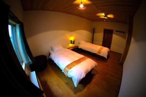 HA-MON Slope Side Hotel and Private Chalet客房内的一张或多张床位