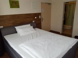 Postel nebo postele na pokoji v ubytování Hotel PrimaVera parco
