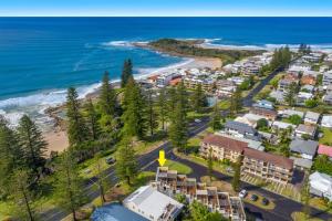 an aerial view of a resort near the beach at Seaspray 1 in Yamba