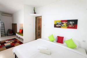 Postel nebo postele na pokoji v ubytování Cornerstone Bali Coworking