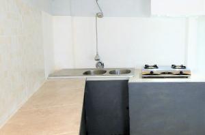 Kuchyň nebo kuchyňský kout v ubytování Cornerstone Bali Coworking