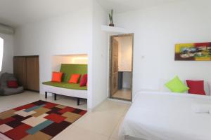 Postel nebo postele na pokoji v ubytování Cornerstone Bali Coworking