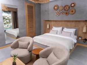 Sa'Rezya Hotel客房内的一张或多张床位