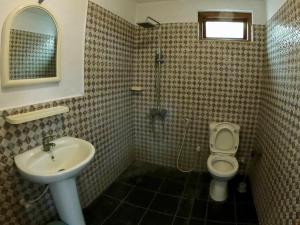a bathroom with a sink and a toilet at Freedom Beach Arugam Bay in Arugam Bay +37 photos