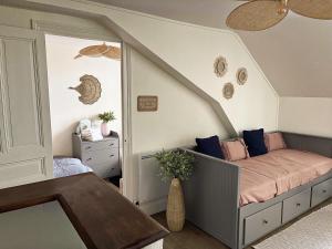 a childs room with a bed in the corner at ☆ Sur les toits de Blois ☆ T2 avec vue Château in Blois