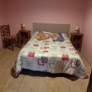 Posteľ alebo postele v izbe v ubytovaní ferme de Bournazel