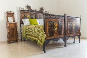 Een bed of bedden in een kamer bij Casa Sampietro