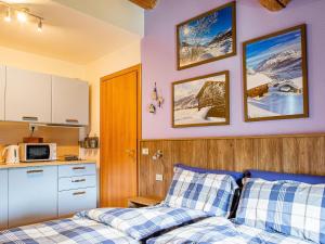 Ein Bett oder Betten in einem Zimmer der Unterkunft Beautiful Holiday Home in Livigno Italy near Ski Area
