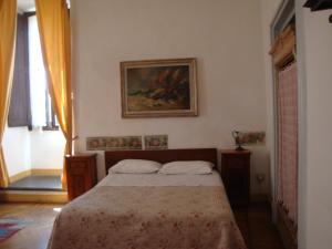 Postel nebo postele na pokoji v ubytování Albergo San Giovanni