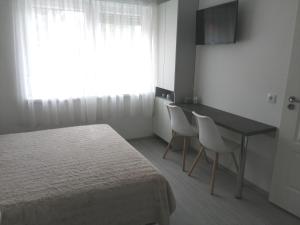 Postel nebo postele na pokoji v ubytování Werner Apartman