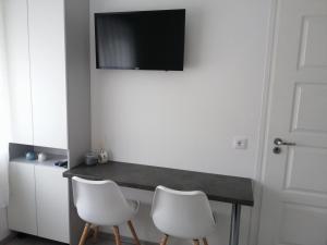 TV a/nebo společenská místnost v ubytování Werner Apartman