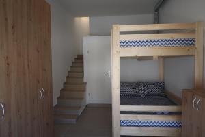 Posteľ alebo postele v izbe v ubytovaní Captains beach home