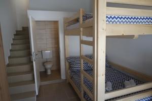 Posteľ alebo postele v izbe v ubytovaní Captains beach home