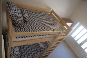 Posteľ alebo postele v izbe v ubytovaní Captains beach home