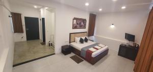 Katil atau katil-katil dalam bilik di Hotel Kandyan View ''Free pickup from Kandy city''