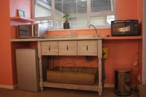 Kuchyň nebo kuchyňský kout v ubytování Spring Close Boutique Cottage Nottingham Road + 25 fotografií