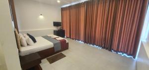 Katil atau katil-katil dalam bilik di Hotel Kandyan View ''Free pickup from Kandy city''
