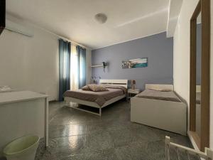 Posteľ alebo postele v izbe v ubytovaní A Casa di Giù B&B