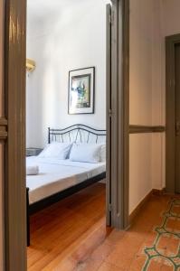 Postel nebo postele na pokoji v ubytování Dioskouros Hostel