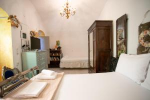 Posteľ alebo postele v izbe v ubytovaní Charouda country house