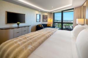 Voodi või voodid majutusasutuse FIVE Zurich - Luxury City Resort toas