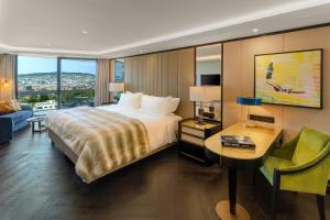 Voodi või voodid majutusasutuse FIVE Zurich - Luxury City Resort toas