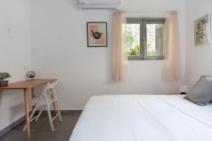 Postel nebo postele na pokoji v ubytování Dioskouros Hostel