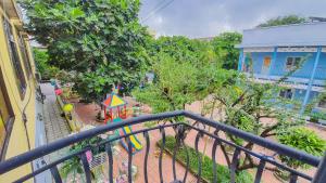 a view of a playground from a balcony at 1984House in Quy Nhon