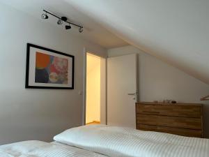 Säng eller sängar i ett rum på Ferienhaus Gmunden