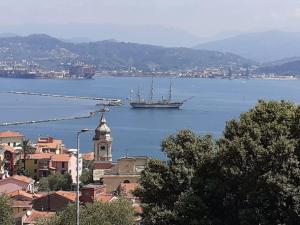 a large boat in a large body of water at La Stanzetta Viola in Fezzano